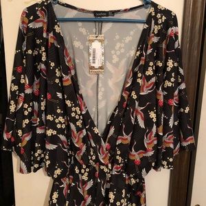 Boohoo size 18 orient floral wrap shirt.